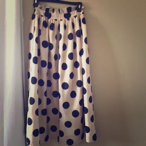 A cream with skirt with polkadots